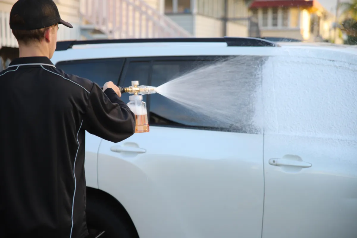 Professional car detailing service in Rockhampton with foam wash application