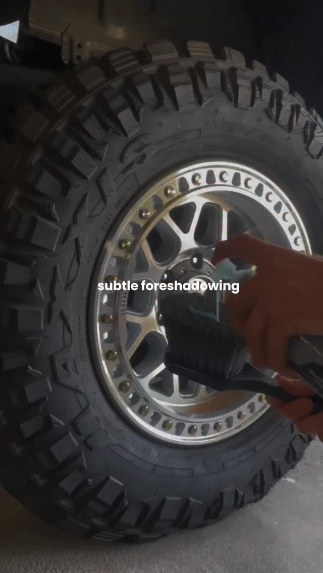 Car detailing Rockhampton - freshly detailed black sedan with glossy paint finish