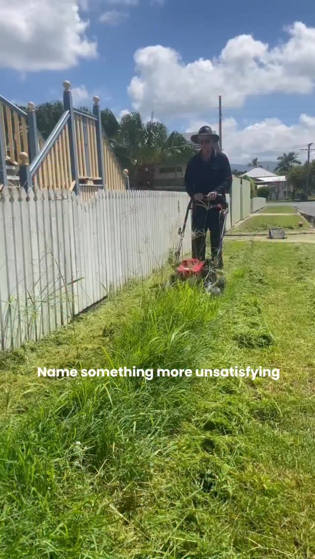 Professional lawn edging work along driveway in Rockhampton